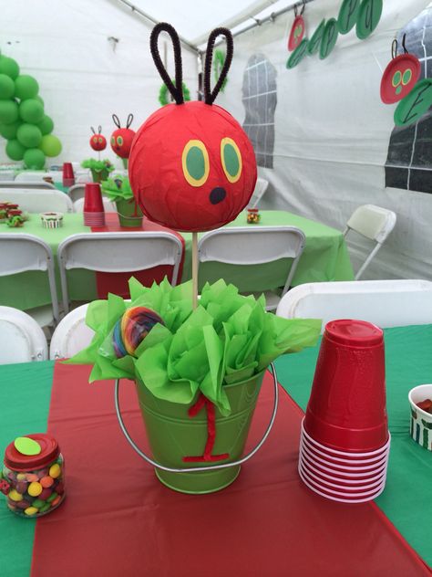 The Hungry Caterpillar Centerpieces, Very Hungry Caterpillar Birthday Party Centerpieces, Diy Very Hungry Caterpillar Decorations, Hungry Caterpillar Centerpiece Ideas, Hungry Caterpillar Centerpiece, Hungry Caterpillar Pinata, Hungry Caterpillar Photo Shoot, Hungry Caterpillar Birthday 1st, One Hungry Caterpillar Birthday