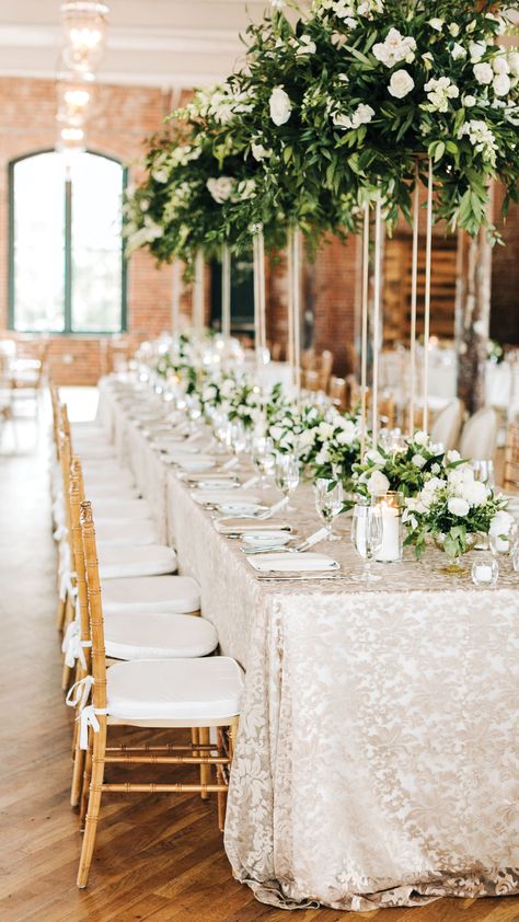 Pure Luxe Bride helped pick these champagne lace tablecloths and tall greenery centerpieces to fill the exposed brick industrial wedding venue at the Cedar Room in Charleston! Lace Wedding Table Decor, Vogue Winter, Lace Tablecloth Wedding, Wedding Reception Rooms, Lace Tablecloths, Tall Wedding Centerpieces, Nye Wedding, Wedding Decor Ideas, Wedding Tablecloths