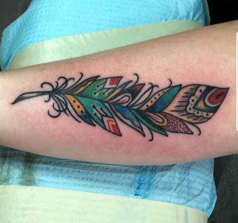 Traditional Feather tattoo done by Lydia @ Ironclad. Old School Feather Tattoo, American Traditional Feather Tattoo, Feather Tattoo Traditional, Celtic Feather Tattoo, Traditional Feather Tattoo, Neotraditional Feather Tattoo, Traditional Peacock Feather Tattoo, Single Tattoos, Arrow Tattoo Peacock Feather