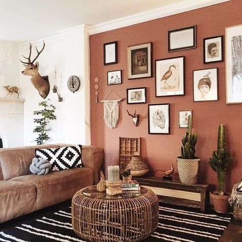 a gorgeous boho living room with a terracotta wall, a gallery wall, some cacti in pots, a leather sofa and a wooven table Remodel Stairs, Interior Hallway, Remodel Farmhouse, Corner Sofa Set, Interior Bedroom, Decor Entryway, Decor Themes, Remodel Bedroom, Boho Living Room