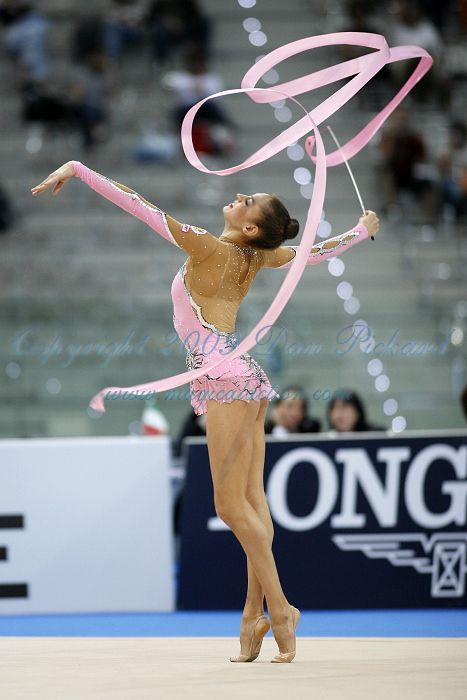 Evgenia KANAEVA (RUS) Ribbon Ribbon Dance Poses, Rythmic Gymnastic Aesthetic, Ribbon Twirling, Rhythmic Gymnastics Aesthetic, Evgenia Kanaeva, Rhythmic Gymnastics Ribbon, Ribbon Gymnastics, Ribbon Dancing, Rhythmic Gymnastics Competition