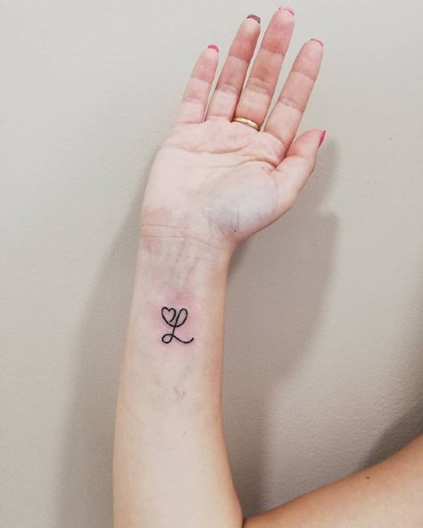 L With A Heart Tattoo, L With Heart Tattoo, Small L Tattoo Letter, L Letter Tattoo Design, L Tattoos For Women, Heart With Letter Tattoo, L Heart Tattoo, L With A Heart, Cursive L Tattoo