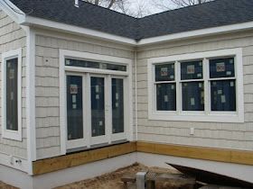 Certainteed Herringbone with white trim and black roof Certainteed Herringbone, Herringbone Siding, Certainteed Vinyl Siding, Certainteed Siding, Raised Homes, Living Room French, Cape Cod Exterior, Building A Gate, Vinyl Siding Colors