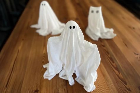 How to Make Cheesecloth Ghosts: A Hauntingly Easy DIY (2024) Cheese Cloth Ghost Diy, Cheese Cloth Ghost, Cheesecloth Ghost Diy, Cheesecloth Ghost, Floating Ghosts, Ghost Diy, Hanging Ghosts, Elmer's Glue, School Glue