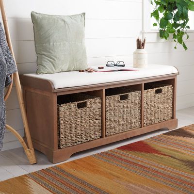 The Painswick Storage Bench is the perfect perch for removing boots in an entryway or garden shoes in the mud room. Crafted of pine in a smooth finish, Painswick's three removable woven baskets provide no-fuss storage, and a white cotton cushion completes the look with comfort and farmhouse charm. Color/Pattern: Sepia | Beachcrest Home™ Painswick Cubby Storage Bench Wood / Canvas / Upholstered / Manufactured Wood in Gray / Brown, Size 20.0 H x 47.0 W x 16.0 D in | Wayfair Storage Bench For Entryway, Bench With Baskets, Entry Bench With Shoe Storage, Cubby Bench Entryway, Entry Way Storage Bench, Bench Shoe Storage, Entry Way Shoe Storage Baskets, Entryway Bench With Storage, Bench Storage