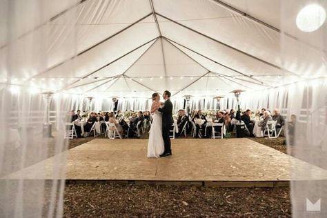 Transformed corral with pallet and plywood dance floor long tables and woodchips. Western Wedding Dance Floor, Pallet Dance Floor Wedding, Diy Dance Floor Cheap, Plywood Dance Floor, Pallet Dance Floor, Wood Dance Floor, Hoedown Throwdown, Cheap Wood Flooring, Sons Wedding