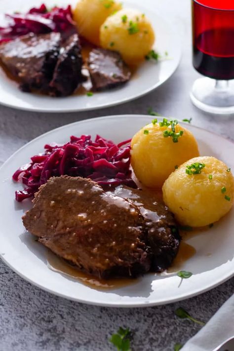 Authentic German Sauerbraten Recipe, German Sauerbraten Recipe, Slow Roast Beef, Oktoberfest Recipes, Sauerbraten Recipe, Potato Dumpling Recipe, Cabbage And Potatoes, Oktoberfest Food, Potato Dumplings