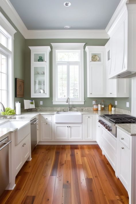 27+ Wall Hues That Make White Kitchen Cabinets Shine - DreamyHomeStyle Sage Walls Kitchen, Sage Green Kitchen Walls White Cabinets, White Kitchen Green Walls, Sage Wall Kitchen, Soft Green Kitchen Walls, Green Walls White Cabinets, Green Kitchen White Cabinets, Green Kitchen Walls White Cabinets, Sage Kitchen Walls