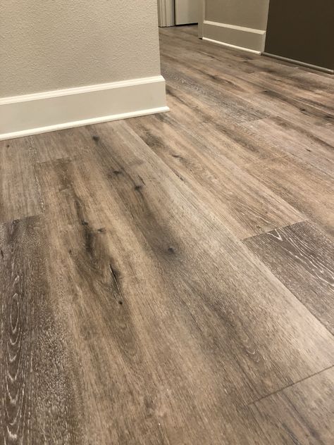 Gray Brown Vinyl Plank Flooring, Vinyl Hardwood Floors Wide Plank, Luxury Vinyl Plank Flooring With Dark Cabinets, Flooring Farmhouse Style, Lvp Flooring Planks Medium Brown, Farmhouse Luxury Vinyl Plank Flooring, Luxury Vynil Plank Flooring Ideas, Farmhouse Lvp Flooring, Vinyl Floor Bedroom