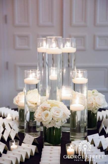 Best Images Floating Candles centerpieces Suggestions Floating candles & table decorations! If people were to request an individual in the event that you #Candles #centerpieces #Floating #Images #Suggestions Wedding Card Table, Wedding Centerpieces Tall, Floating Candle Decorations, Wedding Centerpiece Ideas, Floating Candles Wedding, Floating Candle Centerpieces, Candle Wedding Centerpieces, White Centerpiece, Clear Vases