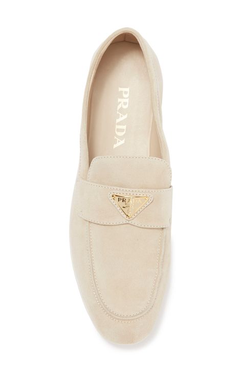 Prada's iconic triangular logo crowns this apron-toe loafer impeccably crafted of velvety suede and set on a flexible rubber sole. Leather upper and lining/rubber sole Made in Italy Designer Shoes Designer Loafers Women, Prada Women Shoes, Luxury Cream Loafers For Women, Prada Boots Beige, Cream Prada Boots, Prada Shoes Loafers, Brown Prada Loafers, Suede Loafers Women, Beige Loafers