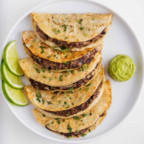 Crispy corn tortillas surround a soft, perfectly-seasoned black bean filling. These tacos are super easy to make and taste even better with a drizzle of avocado cream sauce. Crispy Black Bean Tacos, Crispy Black Bean, Avocado Cream Sauce, Corn Tortilla Recipes, Authentic Mexican Recipes, Creamy Avocado Sauce, Homemade Corn Tortillas, Black Bean Tacos, Taco Fillings