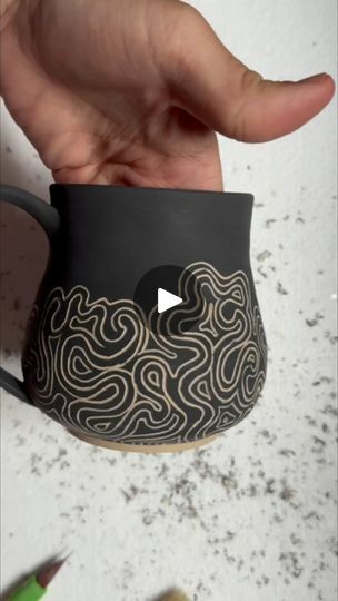 209 reactions · 6 comments | More of those swirly underglaze carves 💫🌀

#pottery #wheelthrownpottery #homeade #mug #mugshotmonday #potteryofinstagram #velvetunderglaze #amacovelvetunderglaze #diamondcoretools #diamondcore #black #sgraffito | Pottery by Rachel Orrino | Chappell Roan · HOT TO GO! Pottery Sgraffito Ideas, Sgraffito Ornaments, Scrifito Pottery, Pottery Underglaze Ideas, Scrafito Pottery, Sgraffito Designs Easy, Sgraffito Tiles, Underglaze Painting On Pottery, Black Clay Pottery