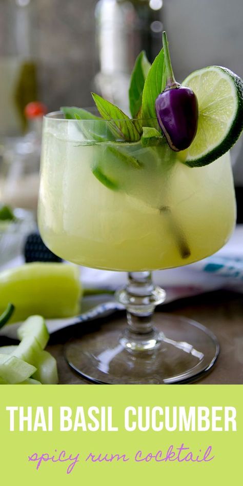 Drinking a Spicy Thai Basil Cucumber Cocktail is a sweet way to enjoy the heat of late summer! Literally! With hot peppers and savory Thai basil, this drink is cool and refreshing, with a nice, slow jalapeno burn at the finish. #cocktail #cocktailrecipes #cocktailhour #cucumber #thaibasil #spicy #rum Basil Drinks, Basil Cocktail, Cucumber Basil, Cucumber Cocktail, Spicy Drinks, Craft Cocktail Recipe, Spicy Cocktail, Coctails Recipes, Spicy Thai