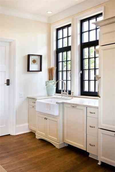 Expand your view by highlighting window frames with black paint.  It turns plain windows into picture frames and pulls your sight lines through the space.  Black also grounds the space and adds a touch of elegance. Black Window Trims, Black Window Frames, Dark Windows, Black Window, House Of Turquoise, Farmhouse Kitchen Island, Interior Windows, Black Windows, Up House