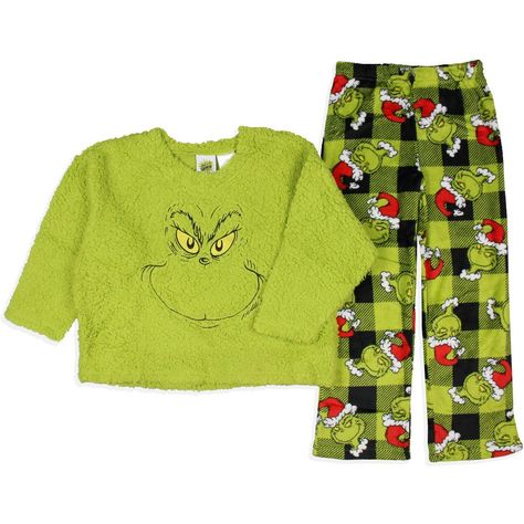 Get ready to steal the show this holiday season with this Officially Licensed pajama set. Whether you are a fan of Dr. Seuss' classic character or looking for cozy and festive PJs, this choice is perfect. This plush fleece set features a green top with an embroidered Grinch face on the front and black and green Santa plaid bottoms. Made with high-quality materials, this sleep set is designed for both comfort and durability. The soft fabric feels gentle against your skin, while the meticulous sti Christmas Pajamas Set, Grinch Apparel, Grinch Sweatpants, Preppy Christmas Wishlist, Stitch Pjs, Green Christmas Pajamas, Grinch Pjs, Grinch Clothes, Kids Christmas Clothes