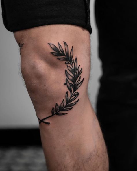 Cool Leg Tats For Men, Knee Branch Tattoo, Olive Branch Tattoo Mens Knee, Around Knee Tattoo Men, Greek Leaves Tattoo Knee, Laurel Knee Tattoo, Flower Knee Tattoo Men, Knee Tattoo Men Ideas, Under Knee Tattoo Men