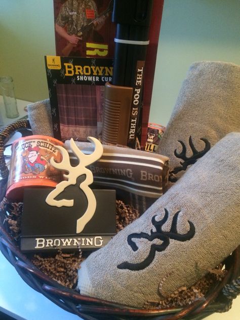 It's a "man basket" ...an awesome gift idea for that special outdoorsman in your life. A basket full of Browning bathroom décor! Bath towels, hand towel, facecloths, shower curtain, toothbrush holder, shotgun plunger & even some Camo toilet paper! Needless to say ...he loved it! Camo Gift Basket Ideas, Man Basket, Camo Gifts, Brown Bathroom Decor, Guy Gifts, Military Decor, Baskets For Men, Bathroom Gifts, Gifts For Hubby