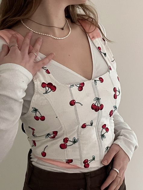 Cute cherry corset outfit for colder weather Cherry Corset Top, Corset Top Aesthetic, Cherry Corset, Top Aesthetic, Tøp Aesthetic, Corset Outfit, Corset Top, Cold Weather, Floral Tops