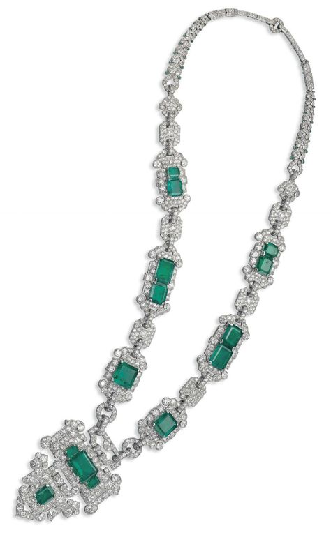 AN ART DECO EMERALD AND DIAMOND SAUTOIR, BY CARTIER. The detachable stylised shield-shaped diamond pendant decorated with cut-cornered rectangular-cut emeralds, to the similarly-set shield-shaped link chain with pavé-set diamond spacers and graduated diamond-set scroll link backchain enhanced with cabochon emerald collets, mounted in platinum, 1926, by Cartier London. #Cartier #ArtDeco #necklace Indian Diamond Jewellery, Bijoux Art Deco, Bvlgari Jewelry, Silver Jewellery Indian, Vintage Inspired Jewelry, Silver Jewellery Sets, Diamond Chain, Silver Jewelry Pendant, Mens Silver Rings