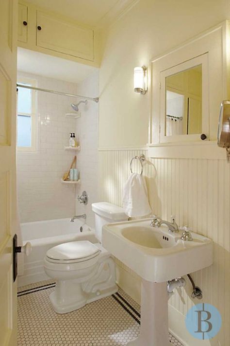 As part of a whole house remodel, to include a new laundry room, family and dining room, and kitchen remodel, this bathroom renovation started with a family’s need to restore its early 20th-century home to its original grandeur while adding the creature comforts that come with 21st century living. Historical Bathroom, 1920s Home Interior, Bungalow Bathroom, Craftsman Home Interiors, Craftsman Bathroom, Wainscoting Bathroom, 1920s House, Eclectic Bathroom, Laundry Room Remodel