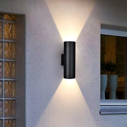 Ivy Bronx Manseau 2 - Bulb Matte Black Outdoor Armed Sconce | Wayfair Modern Black Outdoor Light Fixtures, Up/down Light Wall Sconces, Modern Garage Lights, Outdoor Lighting Black, Exterior Sconces Modern, Outdoor Black Lights, Modern Garage Lights Exterior, Exterior Lights On House Modern, Garage Sconces Outdoor Lighting