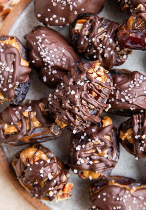 Chocolate Covered Almond Butter Stuffed Dates - The Roasted Root Date Pecan Turtles, Date Turtles, Vegan Turtles, Chocolate Pecans, Stuffed Dates, Chocolate Turtles, Chocolate Covered Almonds, Salty Treats, Desserts Vegan