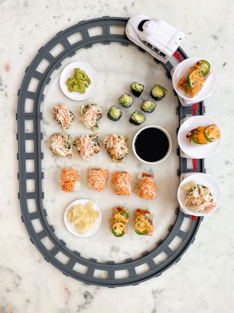 How To Style A Sushi Charcuterie Train - The House of Sequins Rotating Sushi Bar, Traditional Charcuterie Board, Sushi Charcuterie, Train Party Food, Sushi Train, Sweet Brunch, Diy Sushi, Sweet Breakfast Treats, Small Appetizers