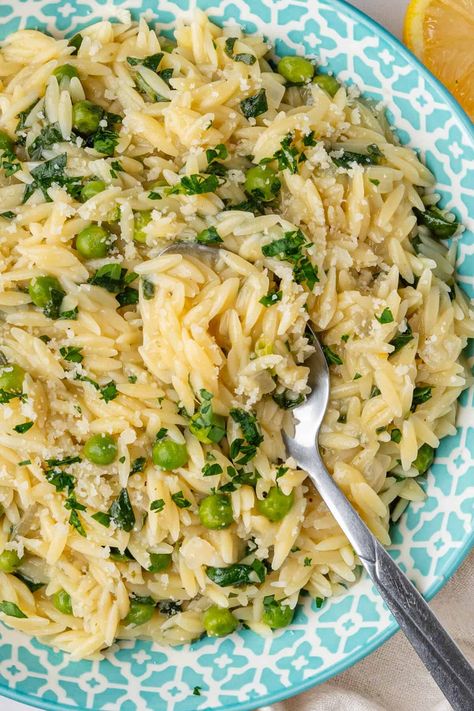 This Lemon Orzo is bright, zesty and makes a perfect side or cozy main. It's made in the one-pot in 20 minutes and includes peas, spinach and parmesan for extra flavor and creaminess without any cream Orzo Creamy, Creamy Orzo Recipes, Limoncello Tiramisu, Breaded Tofu, Greek Lemon Potatoes, Lemon Orzo, Orzo Pasta Salad, Orzo Recipes, Lemon Potatoes