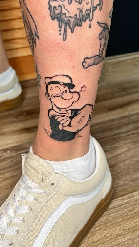 Popeyes Tattoo, Cartoon Tattoos For Men, Pikachu Tattoo Design, Popeye Tattoo, Tattoo Character, Pikachu Tattoo, Egyptian Tattoo Sleeve, Letter Tattoo, Script Tattoo