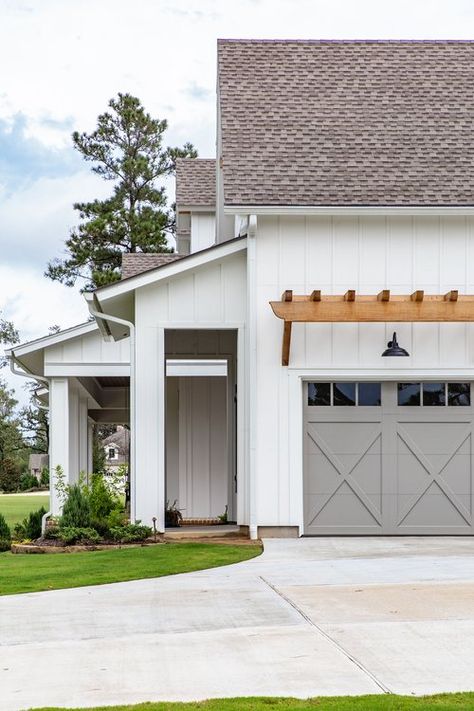 White Farmhouse Garage Doors, Greige Garage Door, White House Grey Garage Door, Garage Door On White House, White Ranch Exterior, Garage Doors On White House, Garage Door Colors With White House, White House Gray Roof, Exterior Garage Ideas