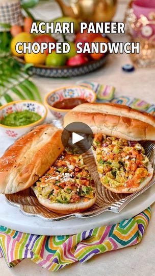 59K views · 1.6K reactions | Achari Paneer Chopped Sandwich — a desi twist on the viral trend, this sandwich is surprisingly easy to make and features roasted paneer in an achari marinade and a kachumber-inspired salad! ✨

This is truly so fun to make and the options with customizing are endless!⭐

Customize the veggies and toppings to your choice and this makes for a fun and nutritious lunch!💕

Loved using @hexclad knife for this recipe! 

Detailed Recipe - https://naturallynidhi.com/achari-paneer-chopped-sandwich/

The clickable link for the full recipe is in my profile bio @naturallynidhi 💕

Comment below if you want a direct link to the recipe!🙌

Achari Marinade:

3 tbsp yogurt
1 tbsp mustard oil
1 tbsp mixed pickle
1/2 tsp salt
1 tsp besan (gram or chickpea flour)
1/4 tsp garam mas Chopped Sandwich, Achari Paneer, Kachumber Salad, Paneer Sandwich, Nutritious Lunch, Mixed Pickle, Paneer Recipes, Mustard Oil, Chickpea Flour