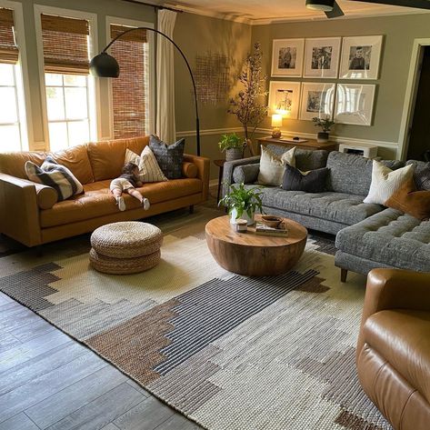 Grey And Brown Couches Together, Gray Sofa Living Room Ideas Bohemian, Earthy Mountain Living Room, Medium Brown Leather Couch Living Room, Earthy Living Room Blue Couch, Grey Eclectic Living Room, Boho Living Room Sectional, Gray And Leather Living Room, Cognac And Grey Living Room