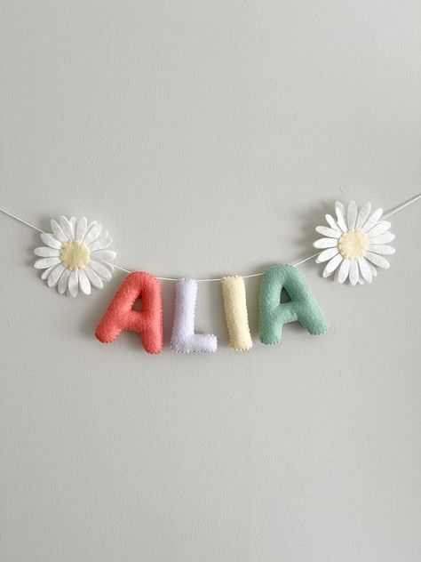 Felt daisy nursery decor name garland Felt Garland Ideas, Felt Nursery Decor, Daisy Nursery, Felt Daisy, Name Garland, Felt Kids, Felt Banner, Felt Letters, Felt Garland