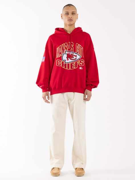 Layer up and stay warm with our vintage style Chiefs Wave Arch hoodie, featuring ribbing at the cuffs and waist, embroidered custom team graphics and made of soft cotton/poly fleece - it's sure to keep you warm all day long.Based in Missouri, the chiefs were founded in 1960 as the Dallas Texans before moving to Kansas City in '63. The team were rebranded the Chiefs after a "name-the-team" contest, named after the then Mayor who's nickname was "Chief." Kc Chiefs Sweater, Vintage Chiefs Sweatshirt, Chiefs Hoodie, Chiefs Apparel, Retro Nba, Retro Nba Jerseys, Kansas City Chiefs Apparel, Kansas City Chiefs Hoodie, Nba Jerseys