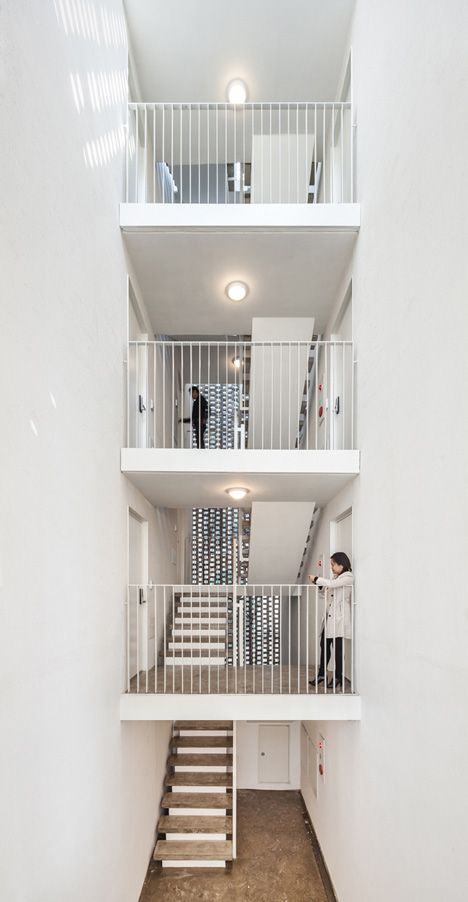 Beyond the Screen by OBBA Apartment Stairs, Small Apartment Building Design, Small Apartment Building, Apartments Exterior, Apartment Exterior, Collective Housing, Apartment Entryway, Building Stairs, Micro Apartment