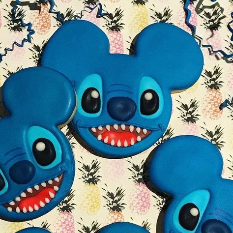 Frosted Fables Cookies on Instagram: "Look who it is !! Back for a repeat performance !! Thank you @ksurrusco I am so glad you liked them !! 😘❤️🍪 #frostedfables #cookiedecorating #cookies #cookiesofinstagram #decoratedcookies #decoratedsugarcookies #cookieart #cookieartist #edibleart #royalicing #royaliceingcookies #liloandstitch #stitch #disney #disneyworldcookies #disneyworld #partyfavors" Stitch Cookies Decorated, Cookie Art, Edible Art, No Bake Treats, 7th Birthday, Royal Icing, Lilo And Stitch, Sugar Cookies Decorated, Sugar Cookies