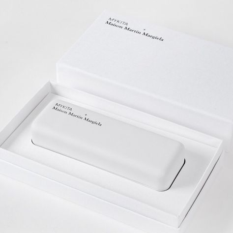 So simple and perfect! Hand-made in Berlin! Find our Mykita + Maison Martin Margiela eyewear collection in store and online at… Eyewear Packaging, Sunglasses Packaging, Graphic Design Packaging, Creative Packaging, Martin Margiela, Packaging Design Inspiration, Print Packaging, Branding Packaging, Design Packaging