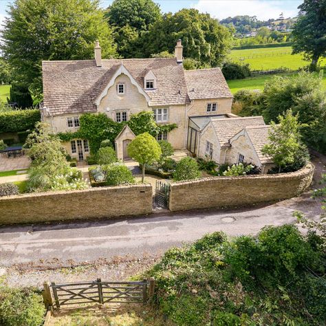 Grade II listed Turnstone House in Painswick offers classic Cotswolds charm and a secondary revenue stream: the five-bedroom house has a three-bedroom cottage that can be let for £150 a night. The house, with its neogothic mullioned windows, is set in almost five acres, with orchards, paddocks and lovely gardens that won a national landscaping award in 2016. 01452 595204, hamptons.co.uk Country Living Uk, British Homes, Cotswold Cottage, British House, Cotswolds Cottage, Code Breaker, Countryside House, English House, The Cotswolds