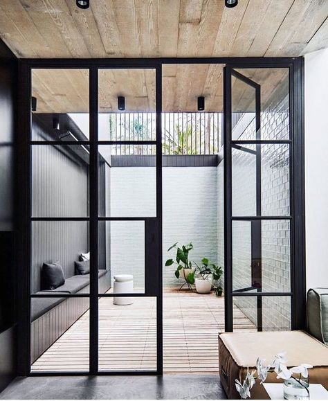 Architectural perfection via @architectprineas Spa In Casa, Interior Courtyard, Steel Frame Doors, Indoor Courtyard, Courtyard Design, Internal Courtyard, Sliding Glass Doors, Patio Interior, Courtyard House