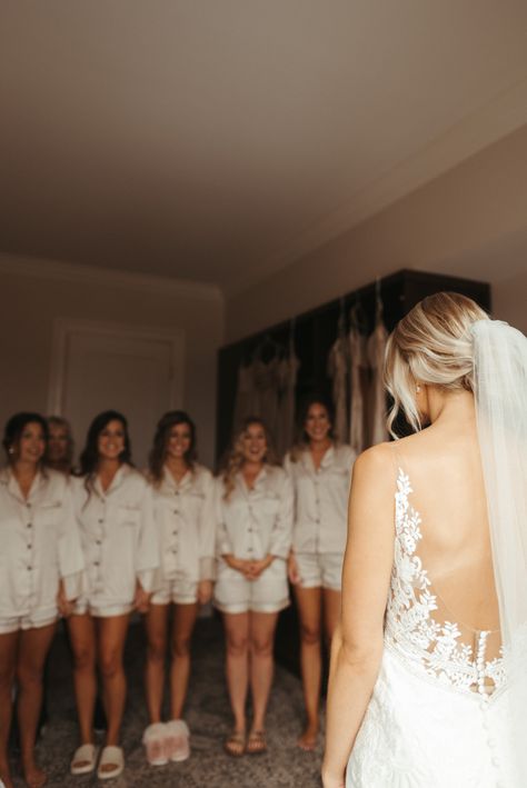 Your husband isn't the only one who will tear up when they see you for the first time on your wedding day. Make sure your photographer is ready for your dress reveal to your bridesmaids too! 😍 Bride Getting Ready Outfit, Dress Reveal, Wedding Dress Reveal, Outfit Bridesmaid, Bridesmaid Pajama, Bridesmaid Pjs, Bridesmaid Pajama Set, Getting Ready Photos, Bridesmaid Pyjamas