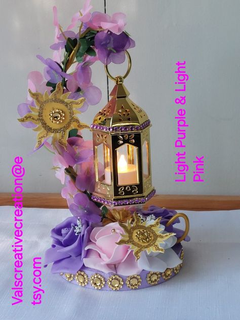 Rapunzel Centerpiece Ideas Diy, Tangled Centerpieces Quince, Tangled Theme Quinceanera Centerpieces, Quince Rapunzel Theme, Rapunzel Theme Quinceanera Decorations, Happily Ever After Prom Theme, Tangled Table Decorations, Rapunzel Centerpiece Ideas Quince, Rapunzel Sweet 16 Theme