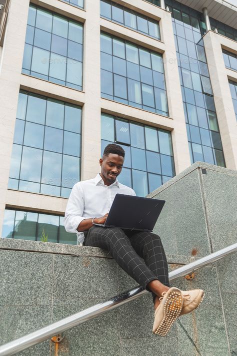 Handsome young businessman working with laptop outdoors at business building by Vladdeep. Handsome young businessman working with laptop outdoors near business building. #Sponsored #businessman, #working, #Handsome, #young Laptop Photography, Working With Laptop, Entrepreneur Photography, Happy Students, Business Photoshoot, Senior Pictures Boys, Men Photoshoot, Outdoor Photoshoot, Outdoor Photos