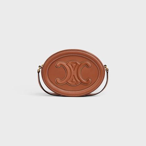 OVAL BAG CUIR TRIOMPHE in SMOOTH CALFSKIN - Tan | CELINE Cuir Triomphe, Oval Bag, Wallets Designer, Bag Wishlist, Celine Triomphe, Fragrance Bottle, Celine Handbags, Dream Bags, Gucci Soho Disco Crossbody