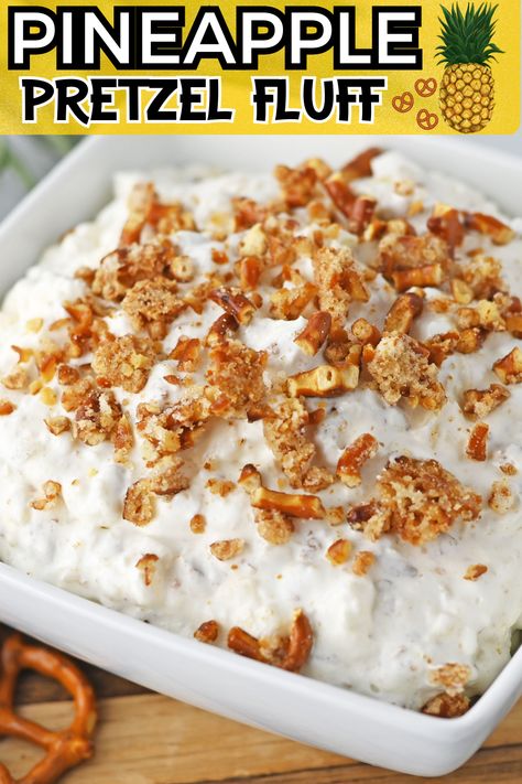 This Pineapple Pretzel Fluff dessert is a perfect blend of sweet pineapple, creamy fluff, and crunchy pretzels that promises a taste of tropical heaven. Pineapple Pretzel Fluff Salad 12 Tomatoes, Pineapple Pretzel Delight, Pineapple Pretzel Fluff Salad, Pineapple Pretzel Salad Recipe, Pretzel Fluff, Pineapple Pretzel Dessert, Pineapple Pretzel Fluff, Pineapple Fluff Recipe, Pineapple Pretzel Salad