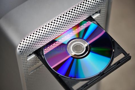 CD or DVD in computer drive. High angle view of shiny CD or DVD in open computer , #Aff, #drive, #High, #computer, #CD, #DVD #ad Dvd Drive, High Angle, Disk Drive, Cd Dvd, Graphic Card, Dvd, Cd, Tower, Stock Images