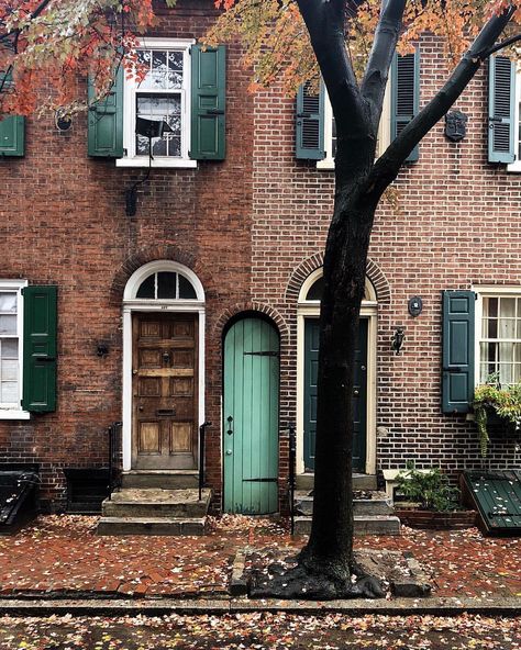 Brick house with green shutters and pop of turquoise on the door. Answering the question, what colors go well with brick exterior? Brick House With Green Shutters, Green Shutters Brick House, Dark Green Shutters, Shutters Brick House, Deck Privacy Ideas, Stain A Deck, House Exterior Before And After, Modern Landscaping Ideas, Charleston Green