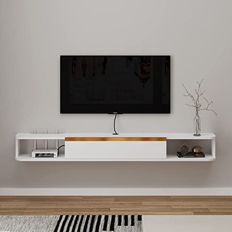 The Wall-mounted floating TV stands with large door will give you extra space. Cable Holes for hiding messy wires, keeping your stuff neatly organized and within reach! Round corner design can effectively prevent the impact of the collision and avoid injury. Made of plywood board and smooth finish on it, its sturdy, durable, Waterproof, anti-friction. Easy to assemble and put together with included illustrations, hardware and tools. Mounted Entertainment Center, Floating Media Console, Wall Tv Stand, Wall Mount Entertainment Center, Floating Tv Cabinet, Bench For Living Room, Floating Tv Console, Tv Media Console, Floating Tv Shelf