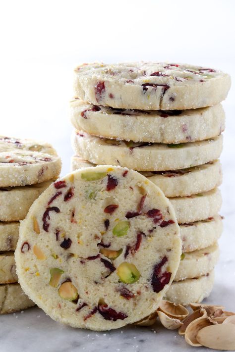 Light and flavorful slice and bake cranberry pistachio cookie recipe from @bakedbyrachel Cranberry White Chocolate Pistachio Cookies, Cranberry Pistachio Cookies, Pistachio Cookie, Cranberry Pistachio Biscotti, White Chocolate Recipes, Coconut Flour Recipes, Pistachio Cookies, Cranberry Pistachio, White Chocolate Cranberry