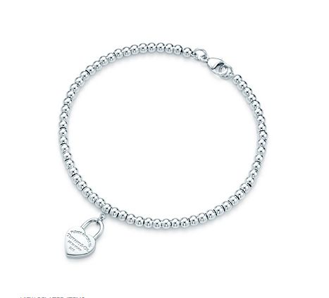 Is it selfish to buy oneself Tiffany & Co. jewelry? Tiffany Charm Bracelets, Bread Bracelet, Tiffany Bead Bracelet, Bracelets Charm, Return To Tiffany, Stackable Bangles, Heart Lock, Tiffany Jewelry, Mini Heart